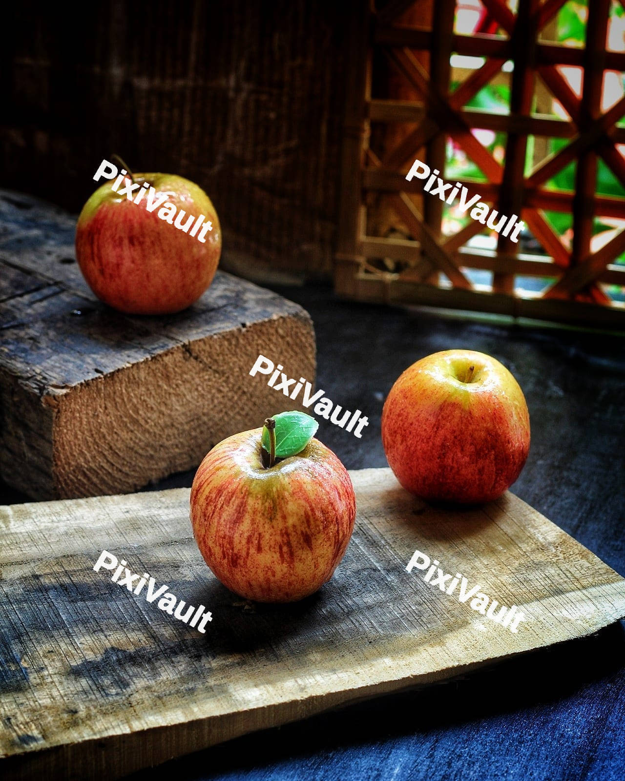 Three red apples